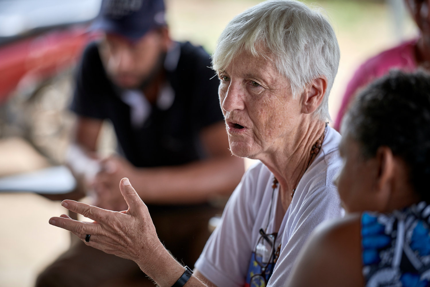 U.S. Sister Kathryn “Katy” Webster, a member of the Sisters of Notre Dame de Namur from the United States, talks with farmers in the countryside near Anapu, in Brazil’s northern Para state.